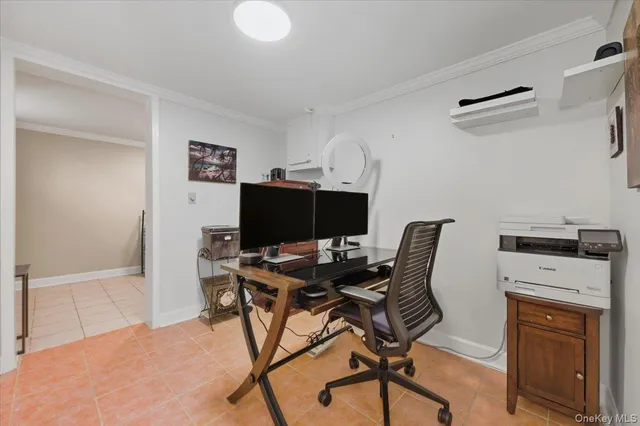 a view of a workspace with furniture