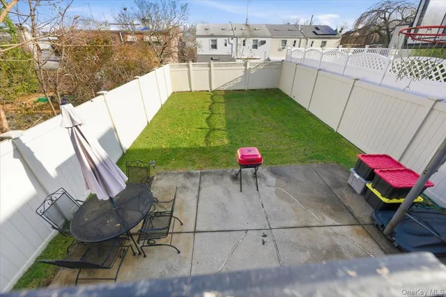 a view of a swimming pool with a patio