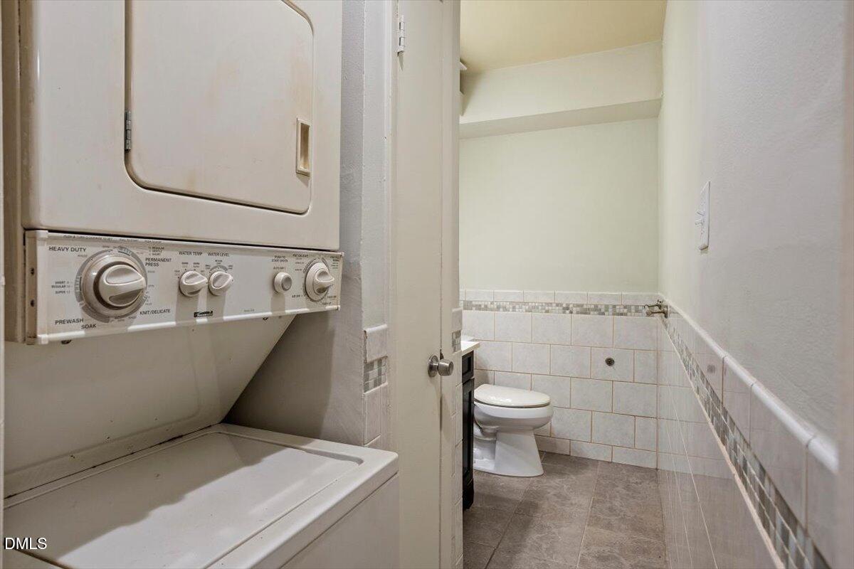 7124 Longstreet Drive, Unit C Raleigh, NC 27615 - Photo 18 of 27 a bathroom with a toilet and a sink