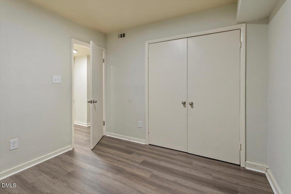 7124 Longstreet Drive, Unit C Raleigh, NC 27615 - Photo 25 of 27 a view of an empty room