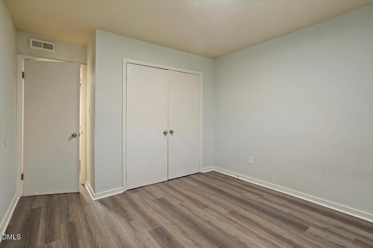 7124 Longstreet Drive, Unit C Raleigh, NC 27615 - Photo 27 of 27 a view of an empty room