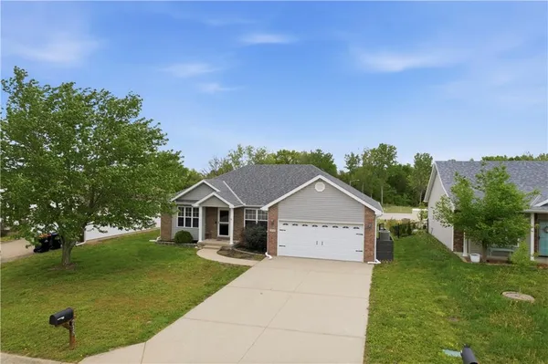$350,000 | 715 Iron Horse Drive, Warrensburg, MO 64093