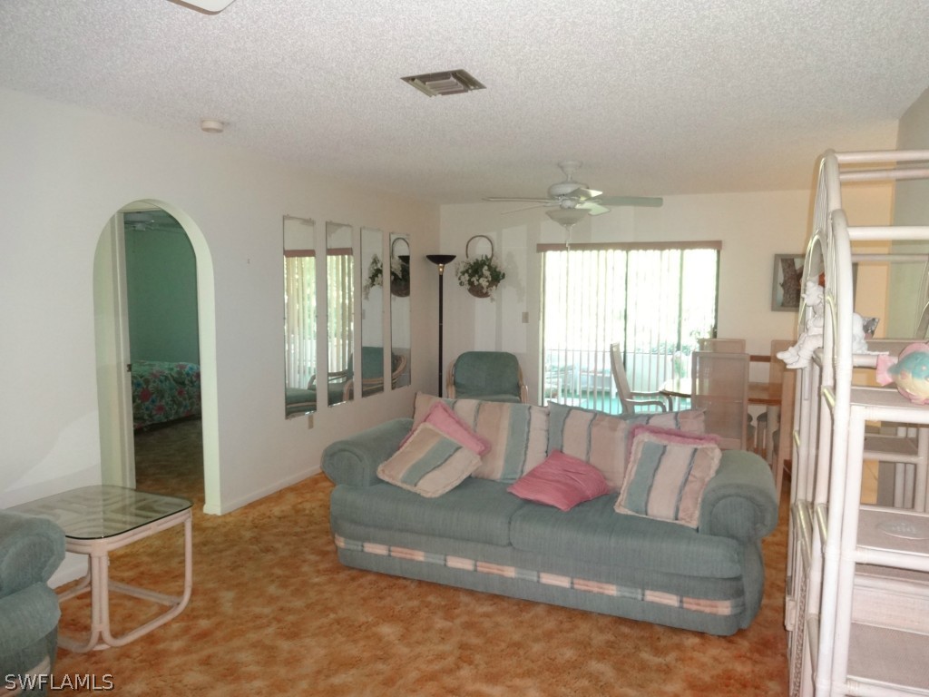 17537 Laurel Valley Road Fort Myers, FL 33967 - Photo 4 of 16 a living room with furniture