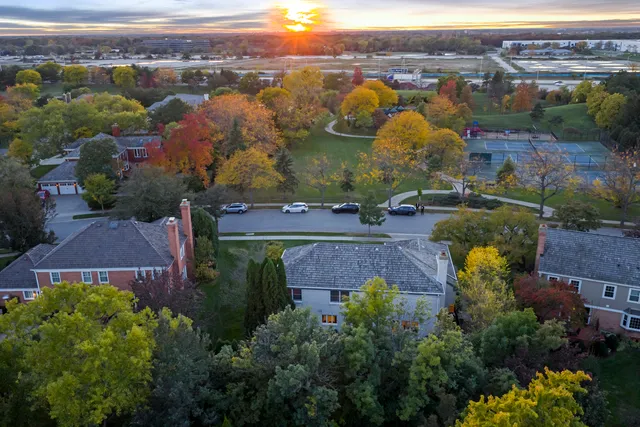 an aerial view of a house with a garden