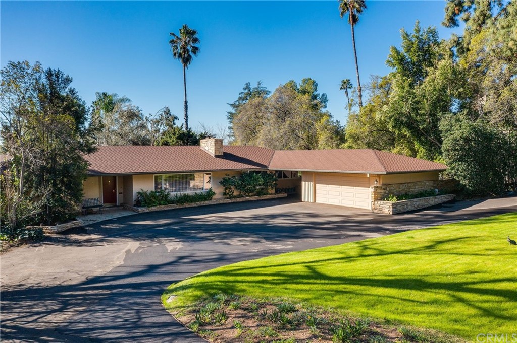 2000 Braeburn Road Altadena, CA 91001 - Photo 1 of 46 a view of a house with swimming pool