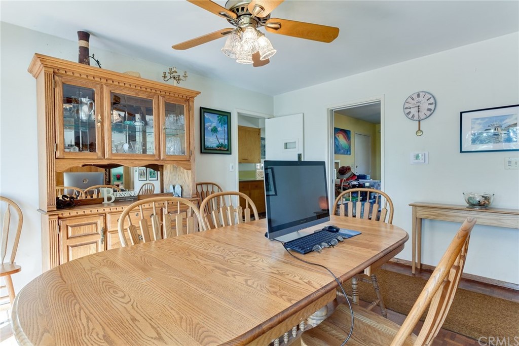 2000 Braeburn Road Altadena, CA 91001 - Photo 11 of 46 a living room with furniture a dining table and chairs with wooden floor