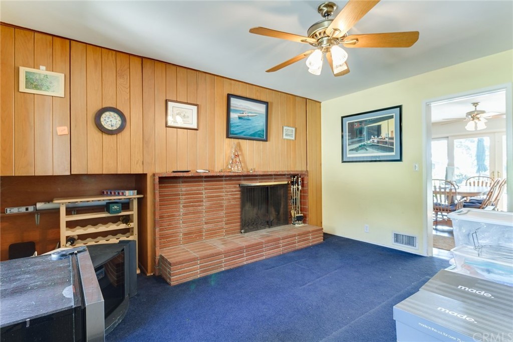 2000 Braeburn Road Altadena, CA 91001 - Photo 13 of 46 a living room with furniture and a fireplace