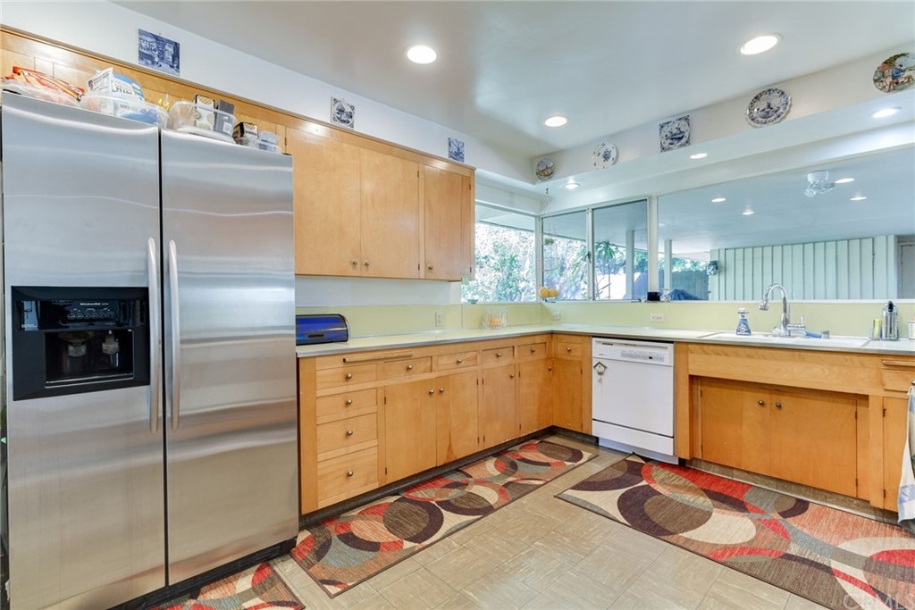 2000 Braeburn Road Altadena, CA 91001 - Photo 14 of 46 a kitchen with sink refrigerator and cabinets