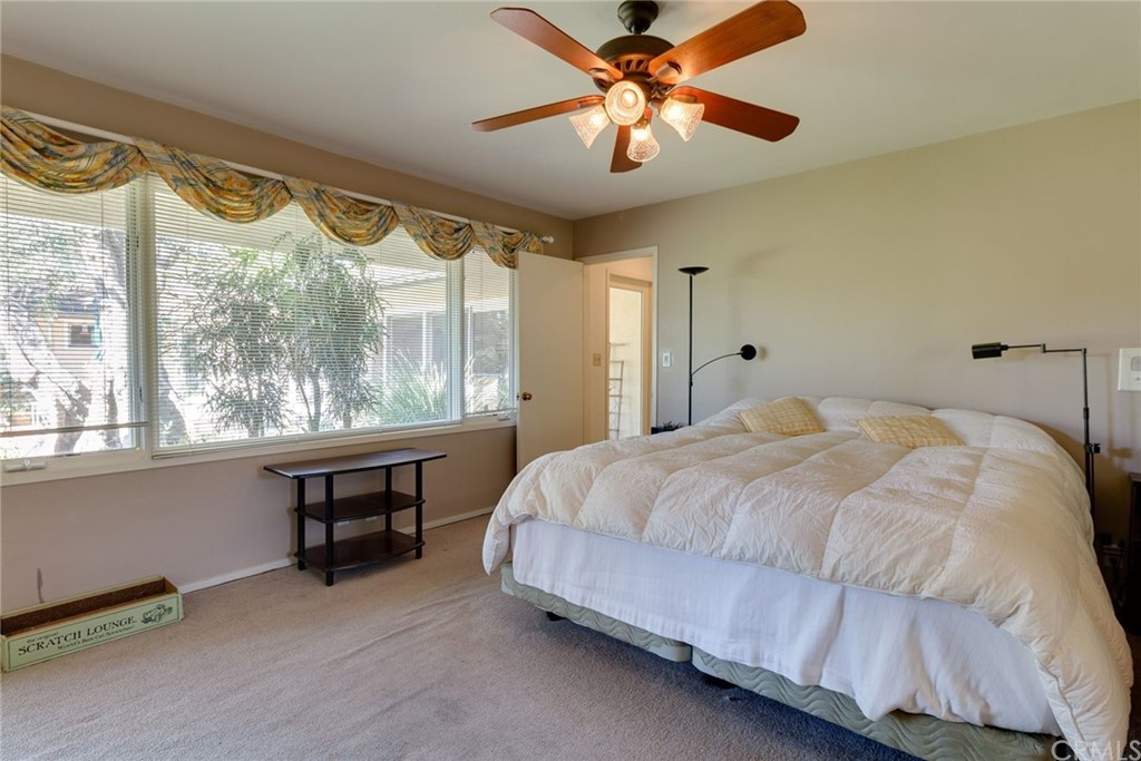 2000 Braeburn Road Altadena, CA 91001 - Photo 20 of 46 a bedroom with a bed and a large window