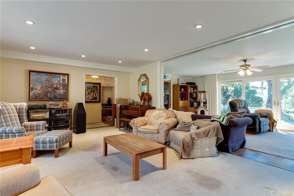 2000 Braeburn Road Altadena, CA 91001 - Photo 3 of 46 a living room with furniture and a flat screen tv