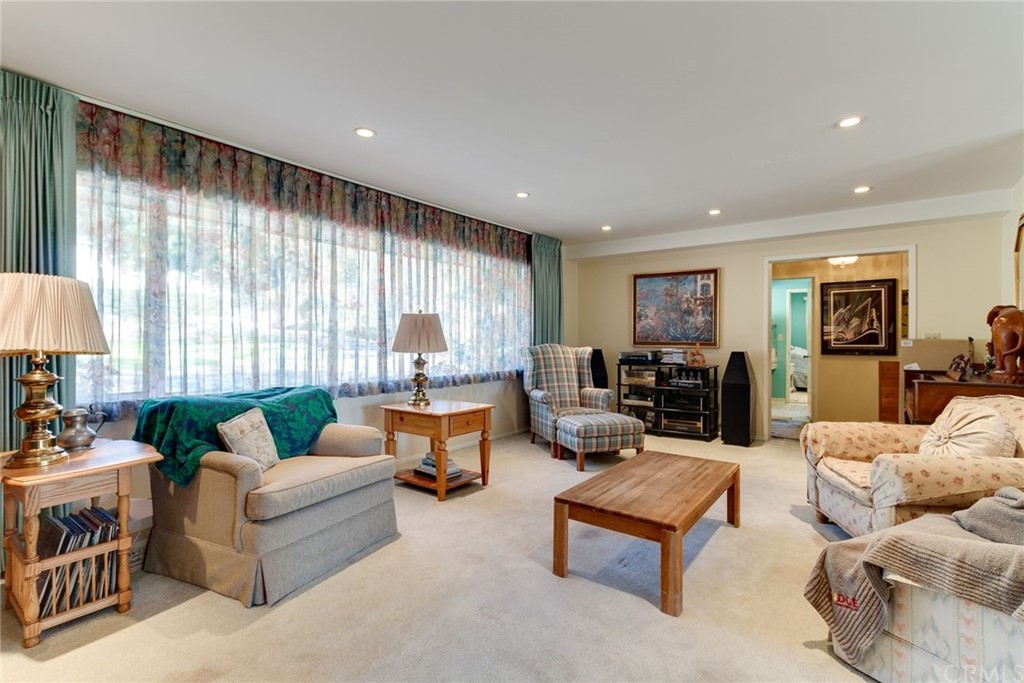 2000 Braeburn Road Altadena, CA 91001 - Photo 4 of 46 a living room with furniture and a large window