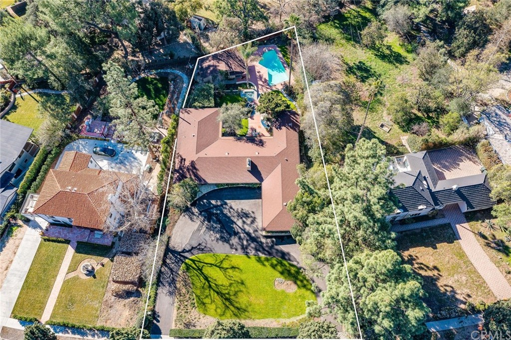 2000 Braeburn Road Altadena, CA 91001 - Photo 46 of 46 an aerial view of a house with swimming pool and large trees