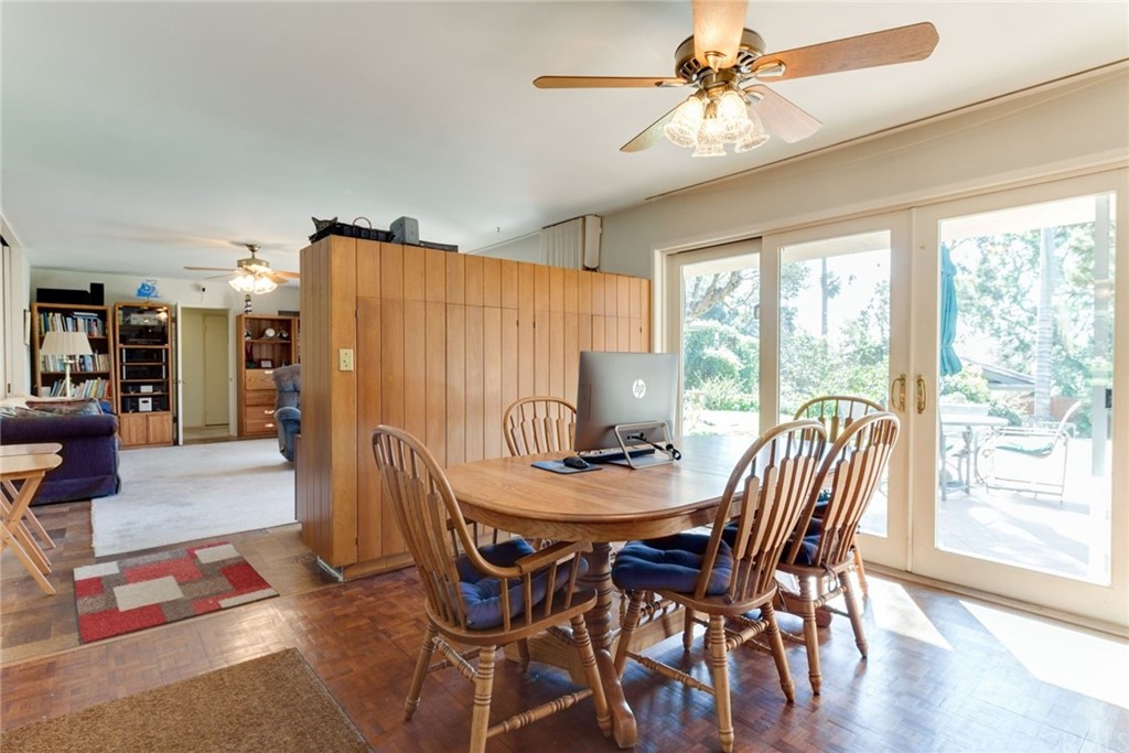 2000 Braeburn Road Altadena, CA 91001 - Photo 10 of 46 a view of a dining room with furniture window and wooden floor
