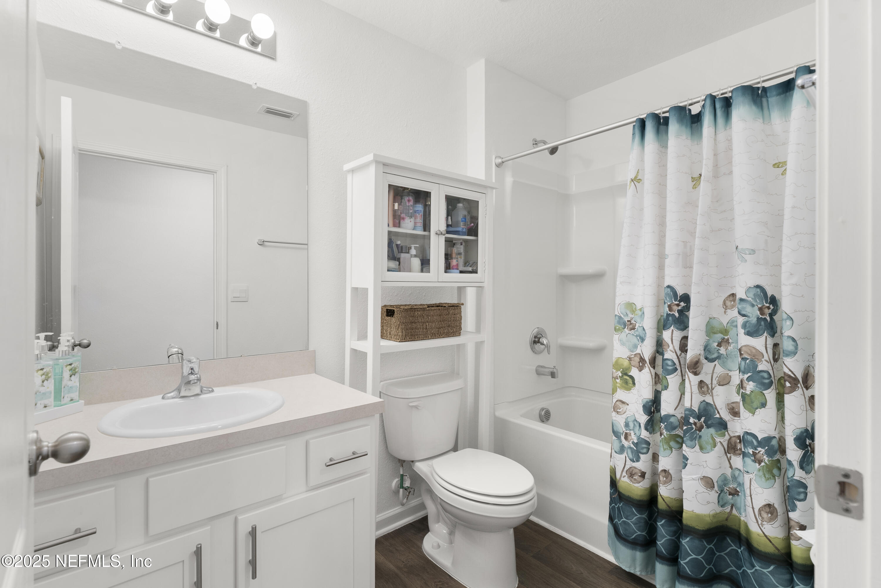 12698 Cucumber Tree Street Jacksonville, FL 32218 - Photo 12 of 26 a bathroom with a sink toilet and shower