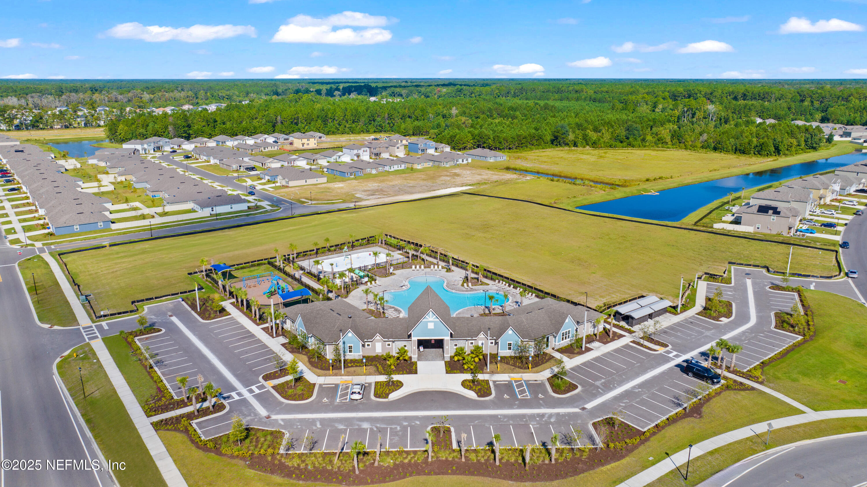 12698 Cucumber Tree Street Jacksonville, FL 32218 - Photo 24 of 26 a view of a swimming pool with an outdoor space and seating area