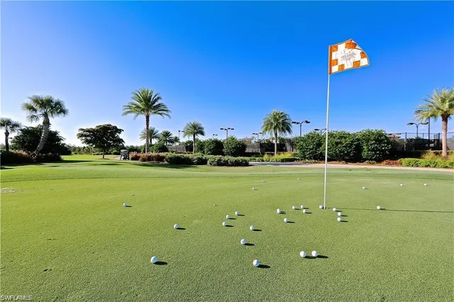 a view of a golf course with a big yard