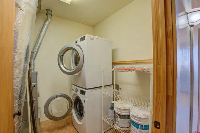 a bathroom with a shower and a toilet