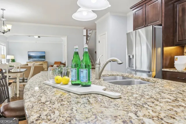 a bathroom with a sink a mirror and a shower
