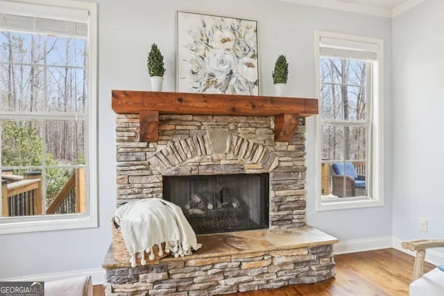 a view of walk in closet with clothes