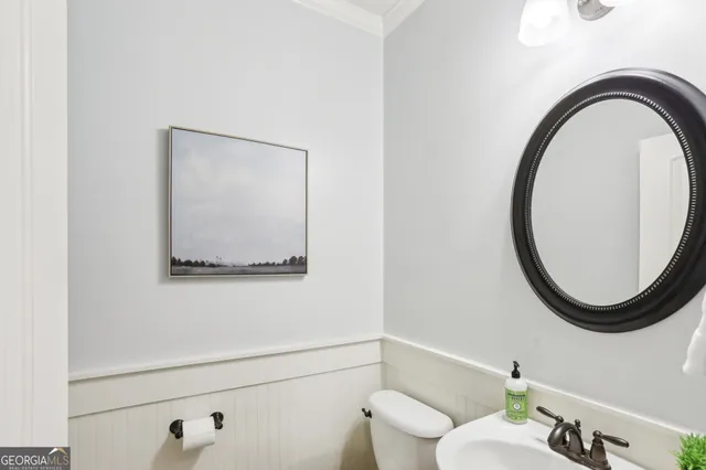 a view of a hallway with a room and a livingroom