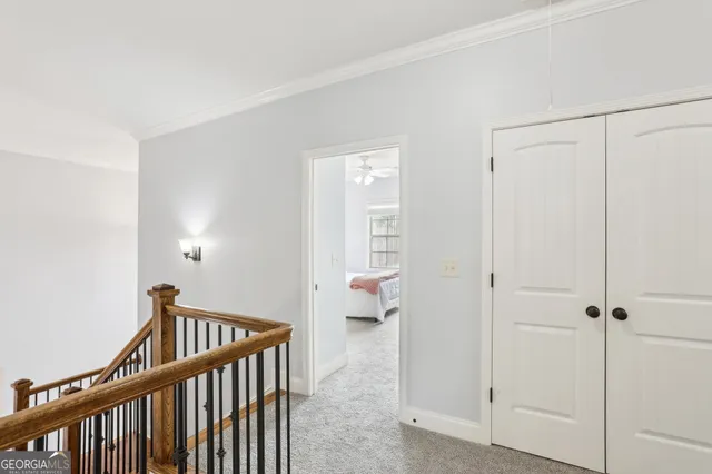 a view of a workspace with furniture and windows