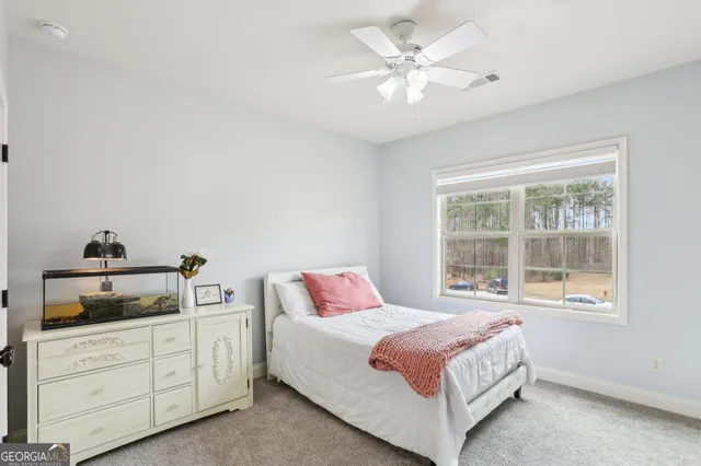 a view of workspace with wooden floor windows