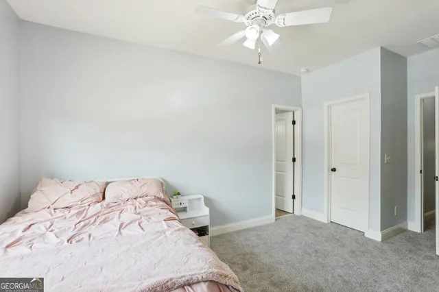 a view of a swimming pool with a backyard