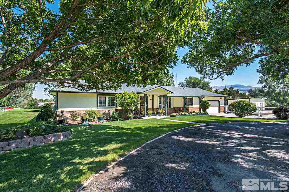 285 Andrew Lane Reno, NV 89521 - Photo 1 of 1 a view of a yard in front of a house