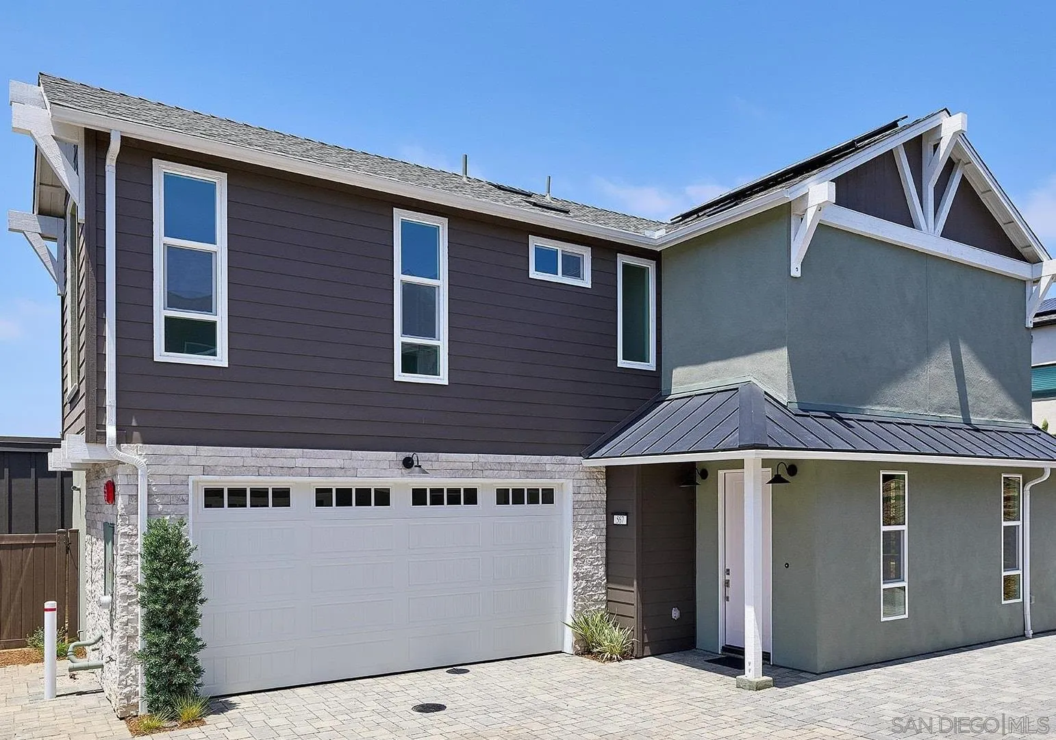 555 North Vulcan Avenue Encinitas, CA 92024 - Photo 1 of 32 a front view of a house with a garage