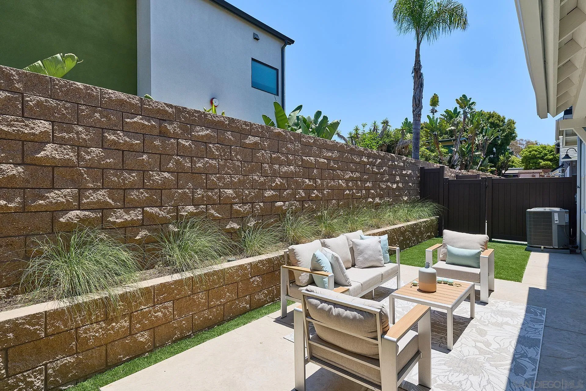 555 North Vulcan Avenue Encinitas, CA 92024 - Photo 12 of 32 a balcony with wooden floor and outdoor seating