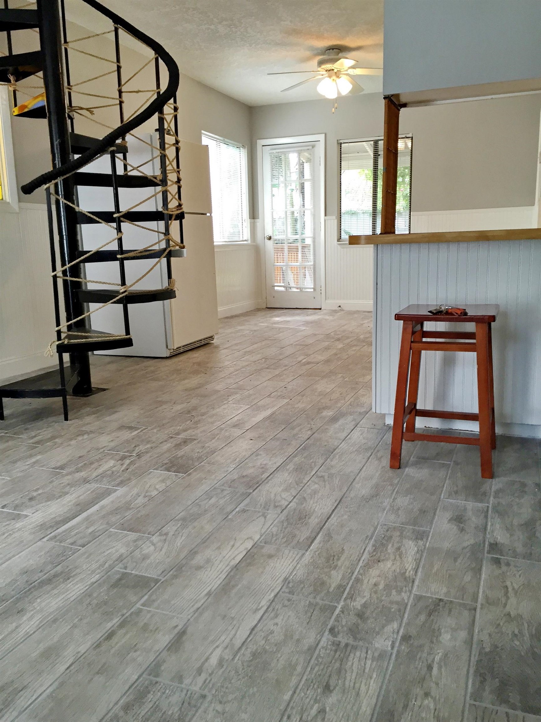 213 A Street St. Augustine, FL 32080 - Photo 19 of 29 a view of a livingroom with furniture and staircase