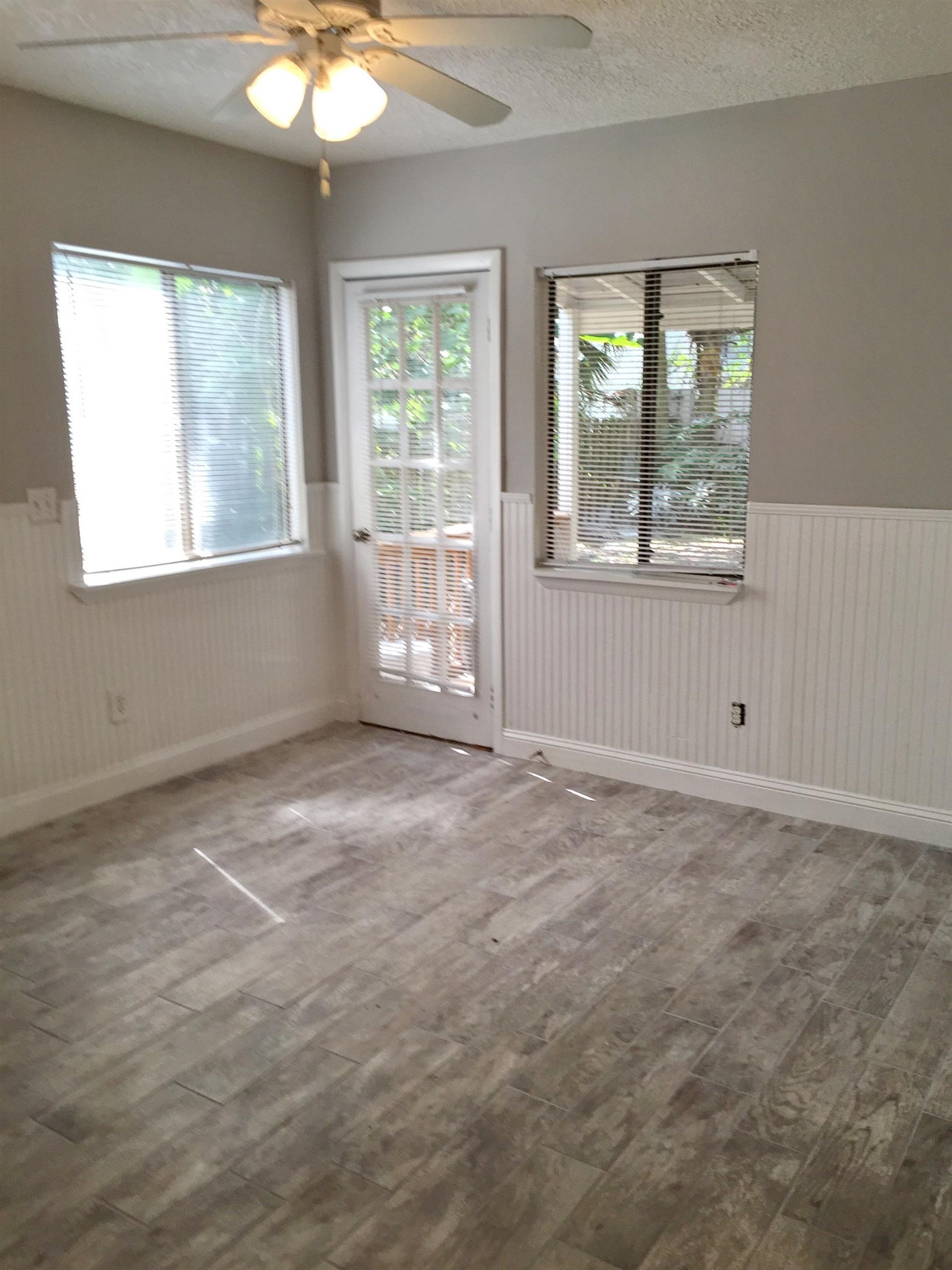 213 A Street St. Augustine, FL 32080 - Photo 20 of 29 an empty room with windows