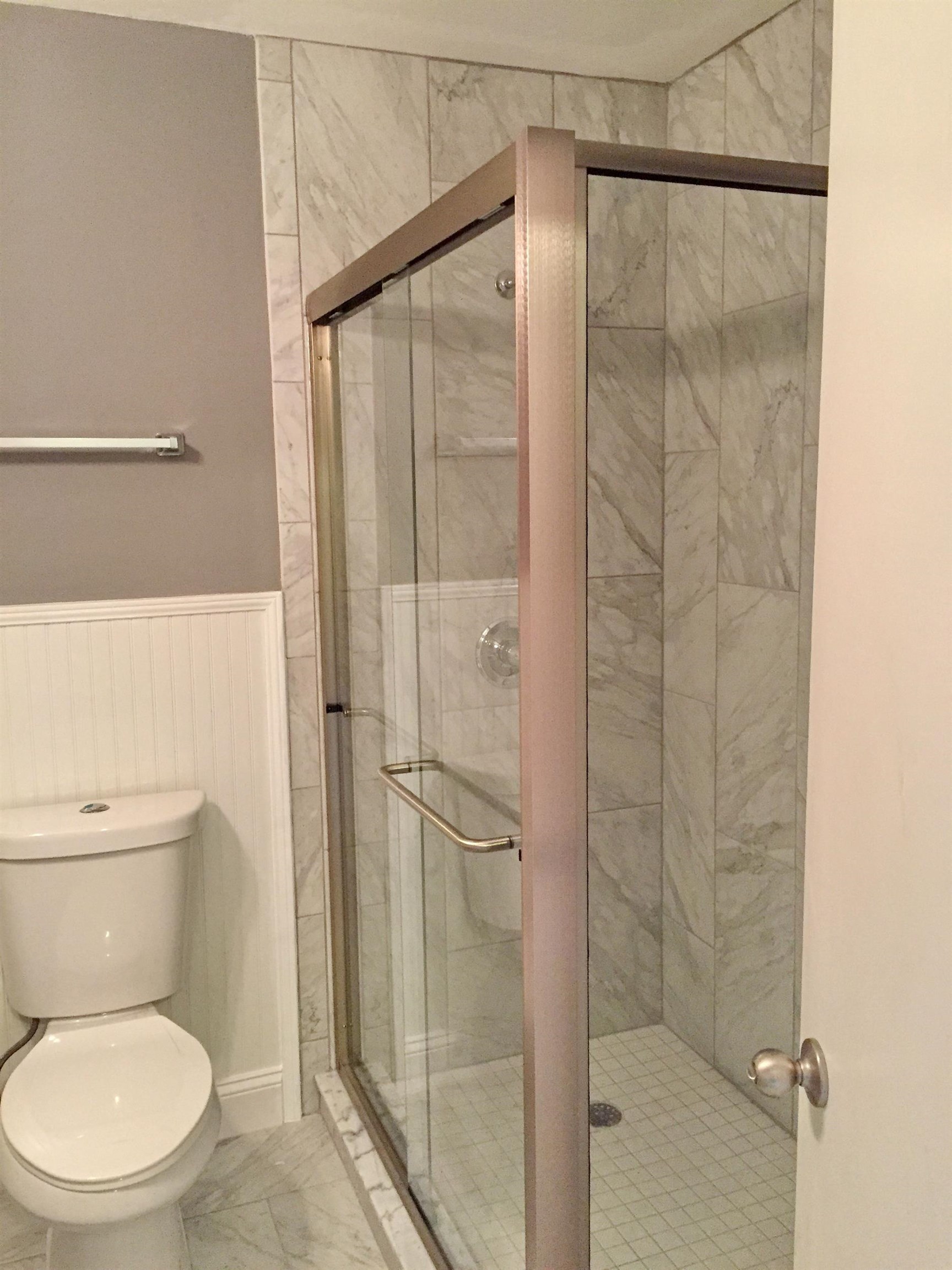 213 A Street St. Augustine, FL 32080 - Photo 22 of 29 a bathroom with a toilet and a shower