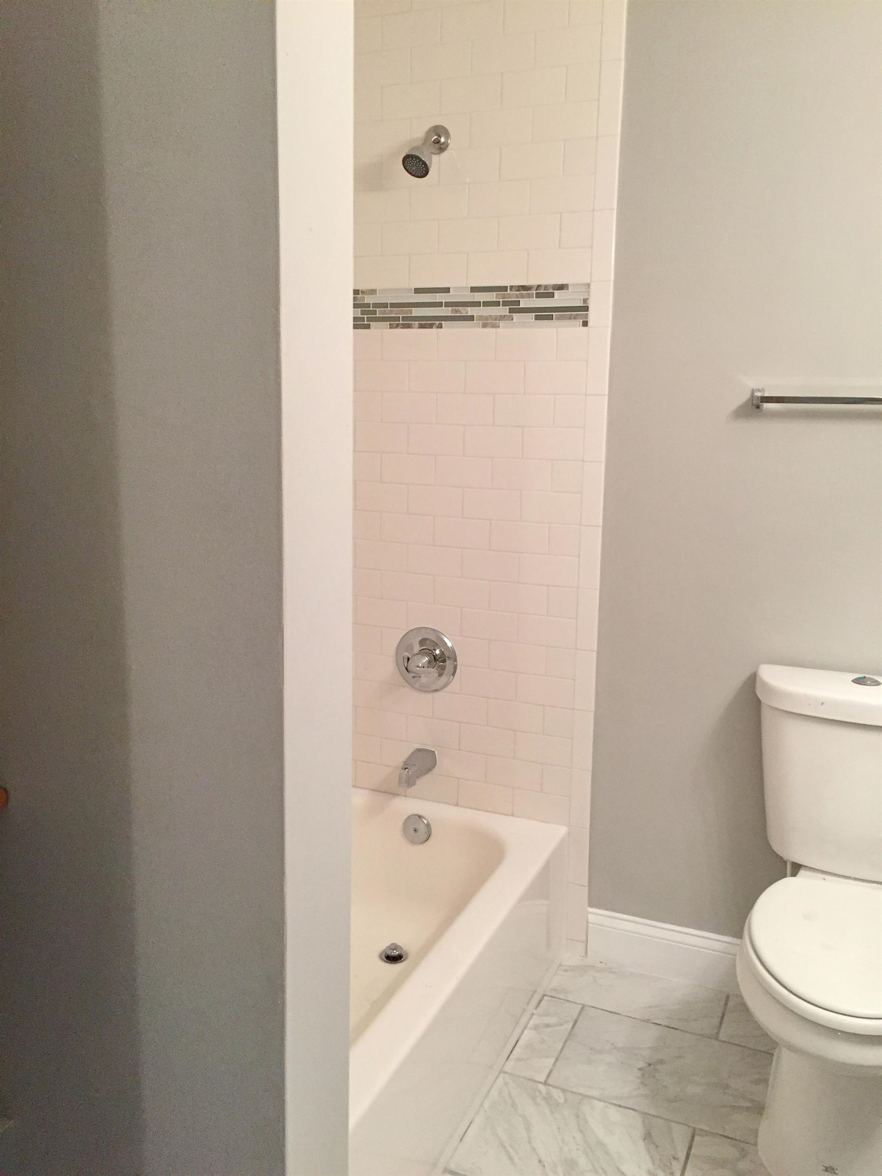 213 A Street St. Augustine, FL 32080 - Photo 23 of 29 a bathroom with a toilet and a bathtub