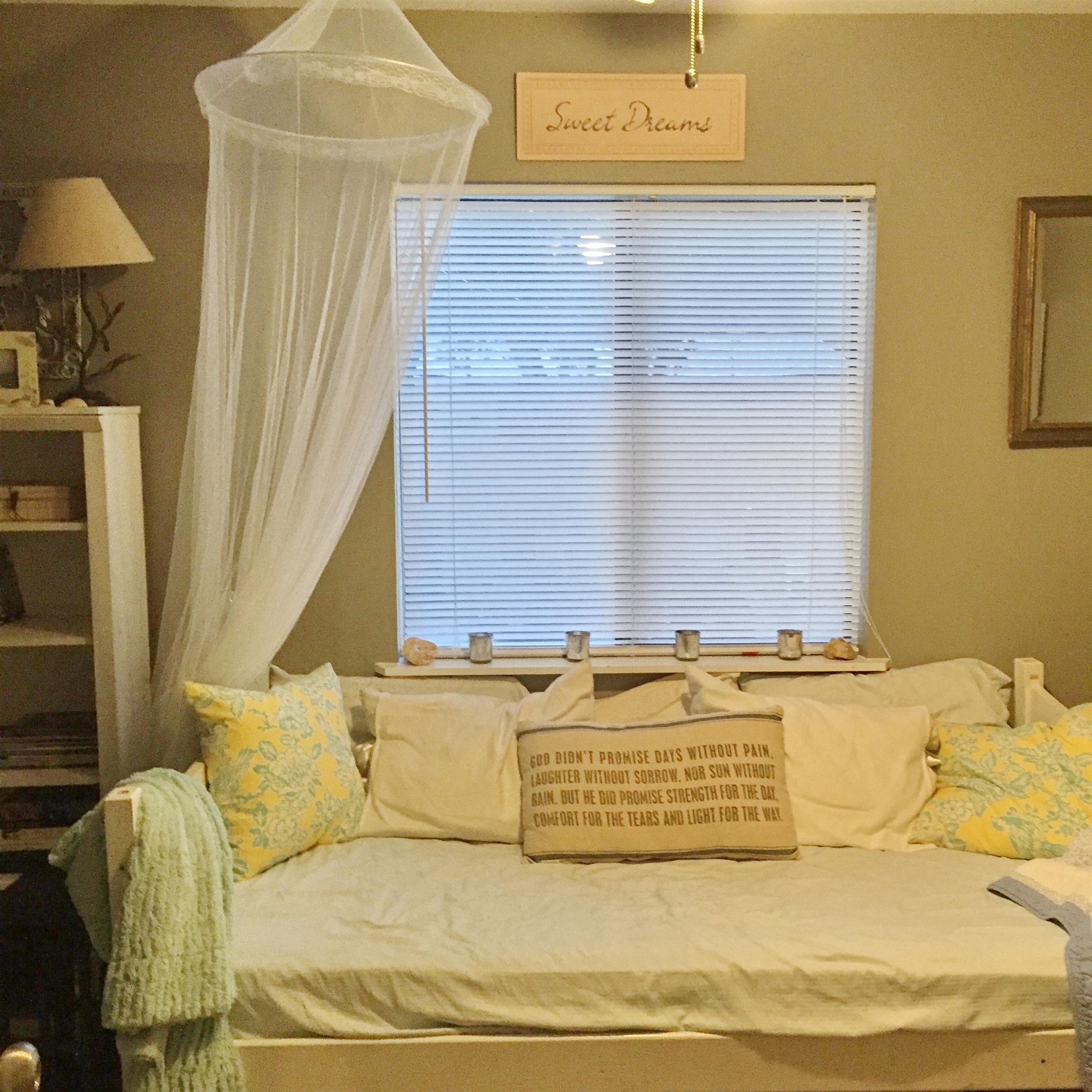 213 A Street St. Augustine, FL 32080 - Photo 24 of 29 a view of a bedroom with a bed and a window