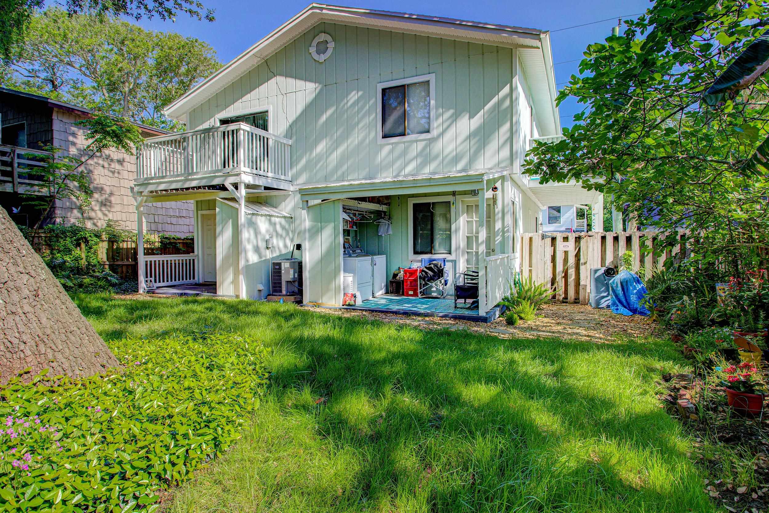 213 A Street St. Augustine, FL 32080 - Photo 10 of 29 a view of a house with a yard and plants