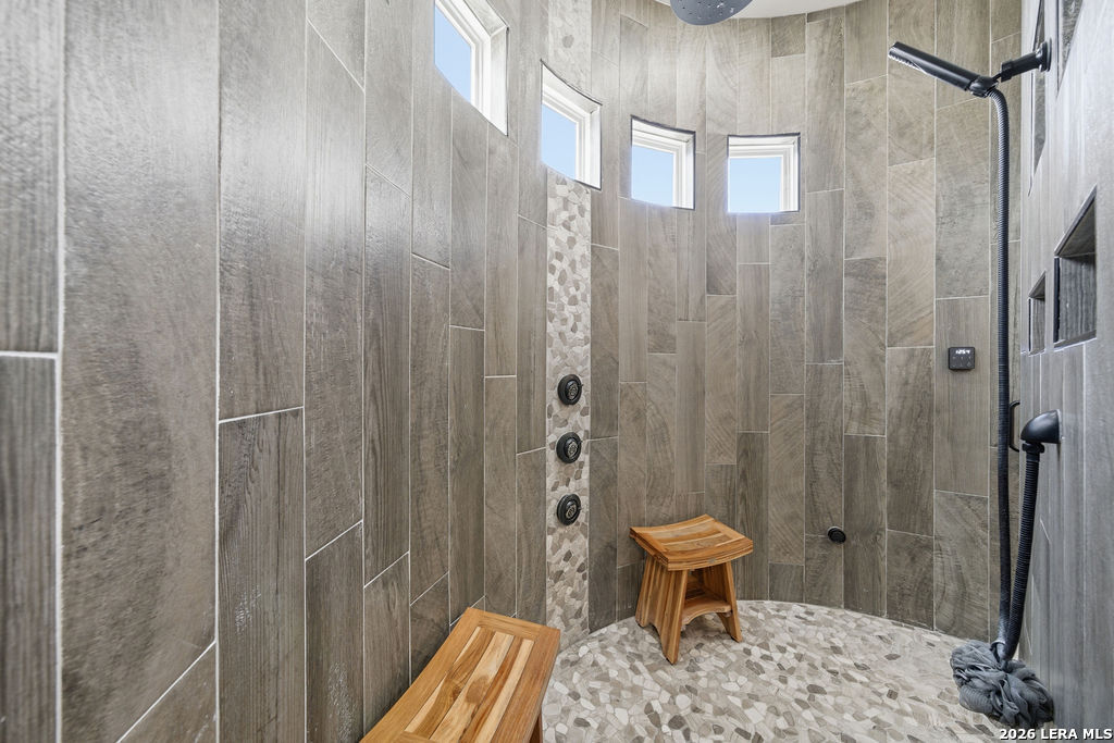 5920 Verden Ridge New Braunfels, TX 78132 - Photo 29 of 61 a bathroom with a toilet and a shower