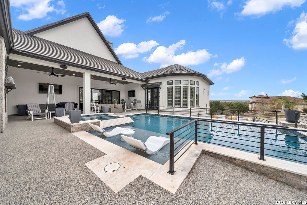 5920 Verden Ridge New Braunfels, TX 78132 - Photo 38 of 61 a view of a house with pool and chairs