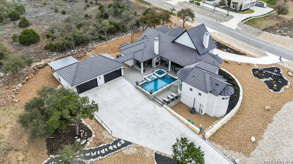 5920 Verden Ridge New Braunfels, TX 78132 - Photo 54 of 61 an aerial view of a house with a swimming pool
