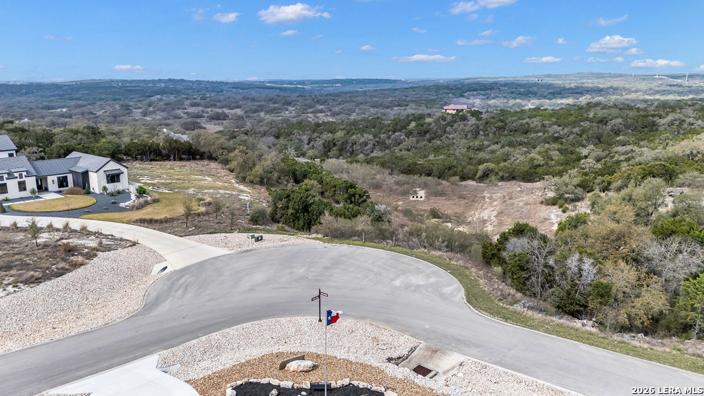 5920 Verden Ridge New Braunfels, TX 78132 - Photo 6 of 61 a view of a terrace with a yard and mountain in the background