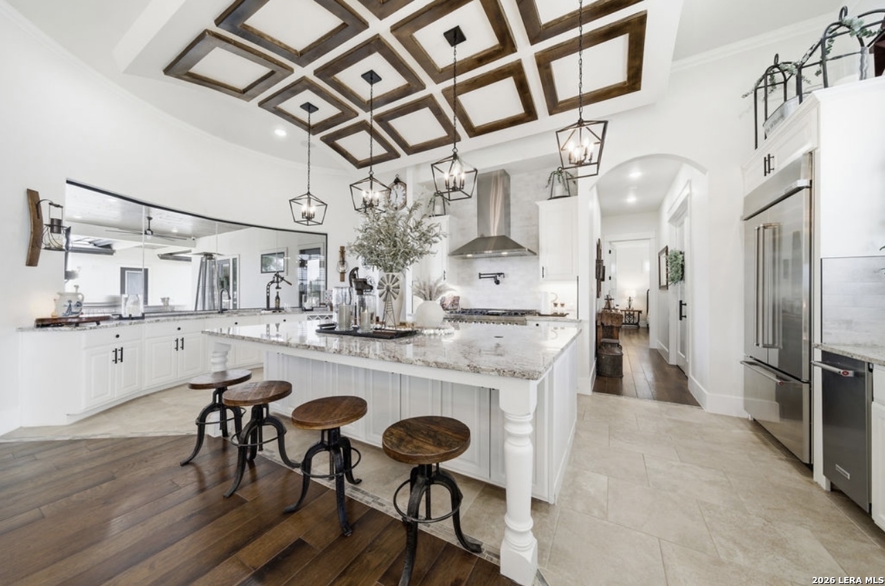 5920 Verden Ridge New Braunfels, TX 78132 - Photo 10 of 61 a kitchen with stainless steel appliances granite countertop a refrigerator and microwave