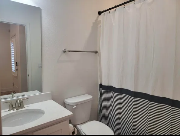 a bathroom with a sink and a toilet