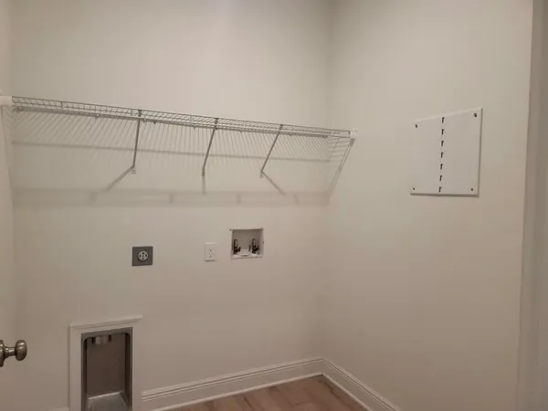 a view of a room with racks on the wall