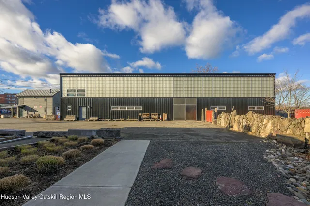 a view of a swimming pool with a yard