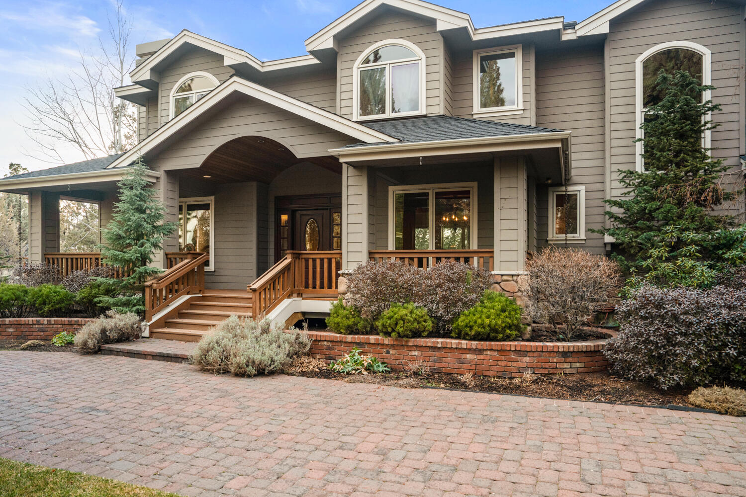 61445 Gosney Road Bend, OR 97702 - Photo 1 of 83 a front view of a house with a yard