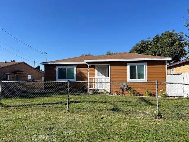 a house view with a garden space