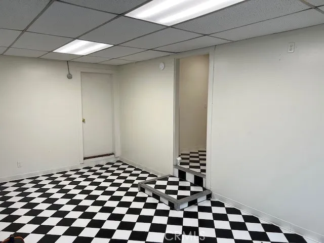 a black and white checkered floor with a black white checkered floor