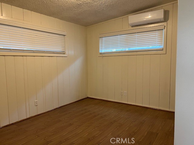 3909 Glen Way El Monte, CA 91731 - Photo 14 of 22 a view of an empty room with wooden floor and a window