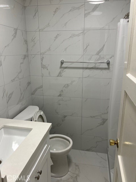 3909 Glen Way El Monte, CA 91731 - Photo 18 of 22 a bathroom with a sink a toilet and shower