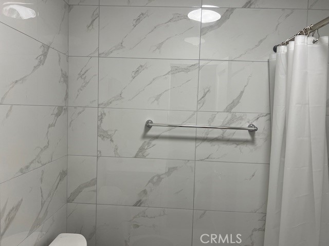3909 Glen Way El Monte, CA 91731 - Photo 19 of 22 a bathroom with a shower